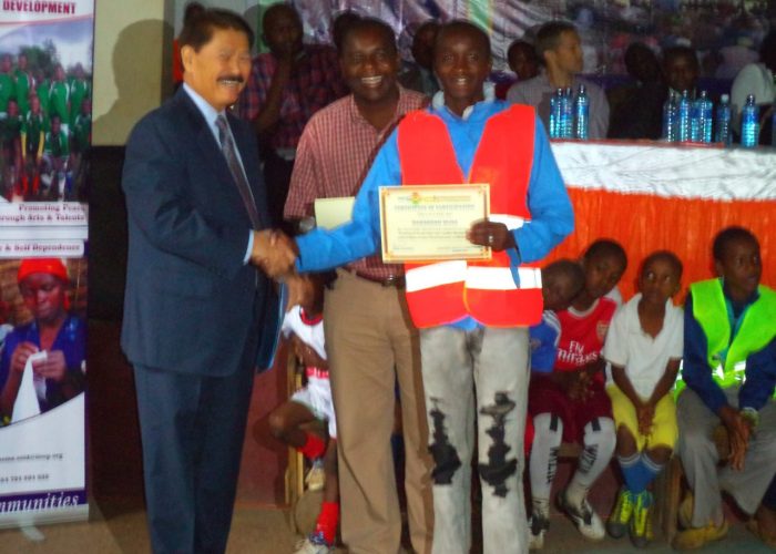 Awarding Certificates to Peace Ambassadors in Majengo.